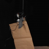 Couseuse portative pour sac papier grande contenance - Couseuse grise